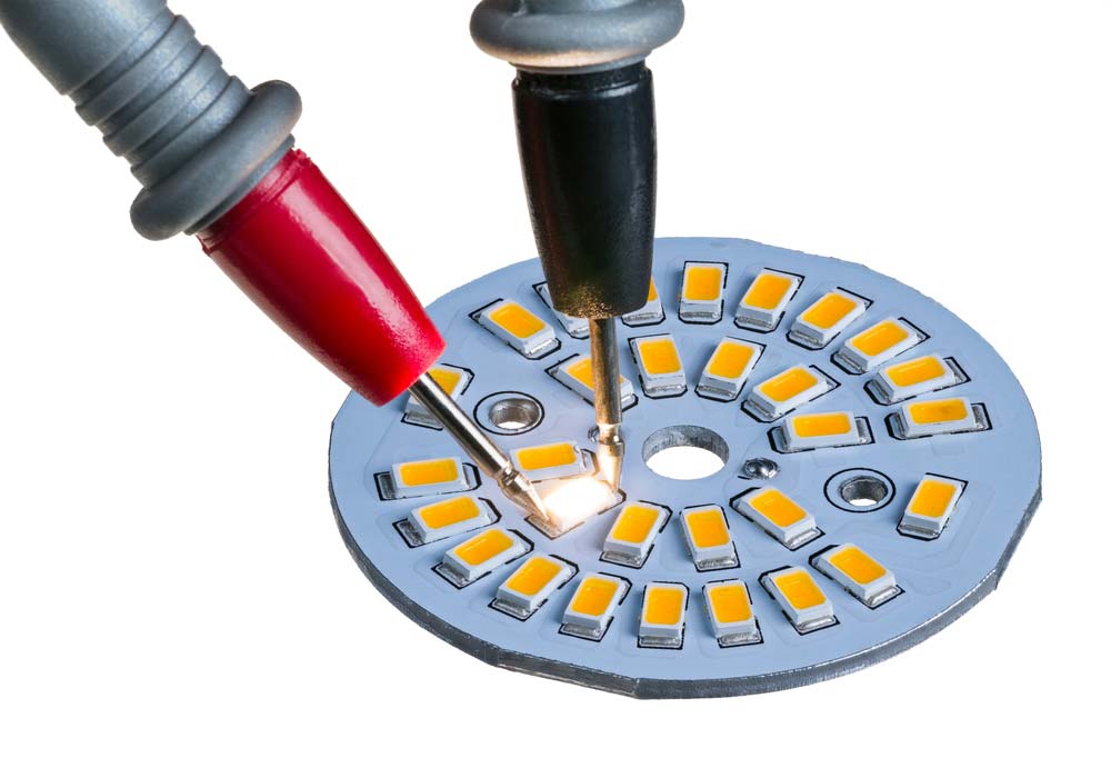 Test probes on an LED aluminum PCB