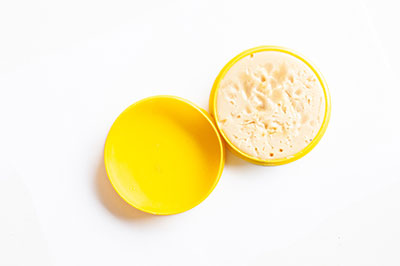 Solder flux paste in a yellow jar
