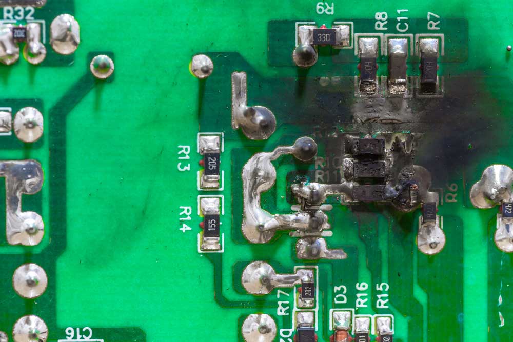 Repair short-circuited electronic component on a PCB