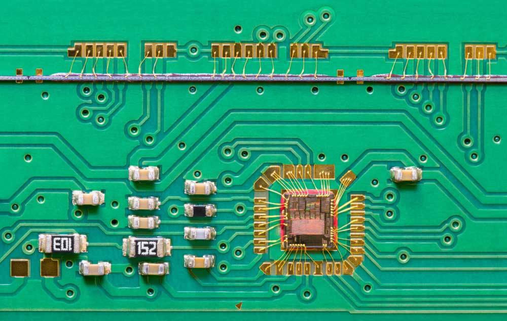 An integrated circuit die wired directly to a PCB