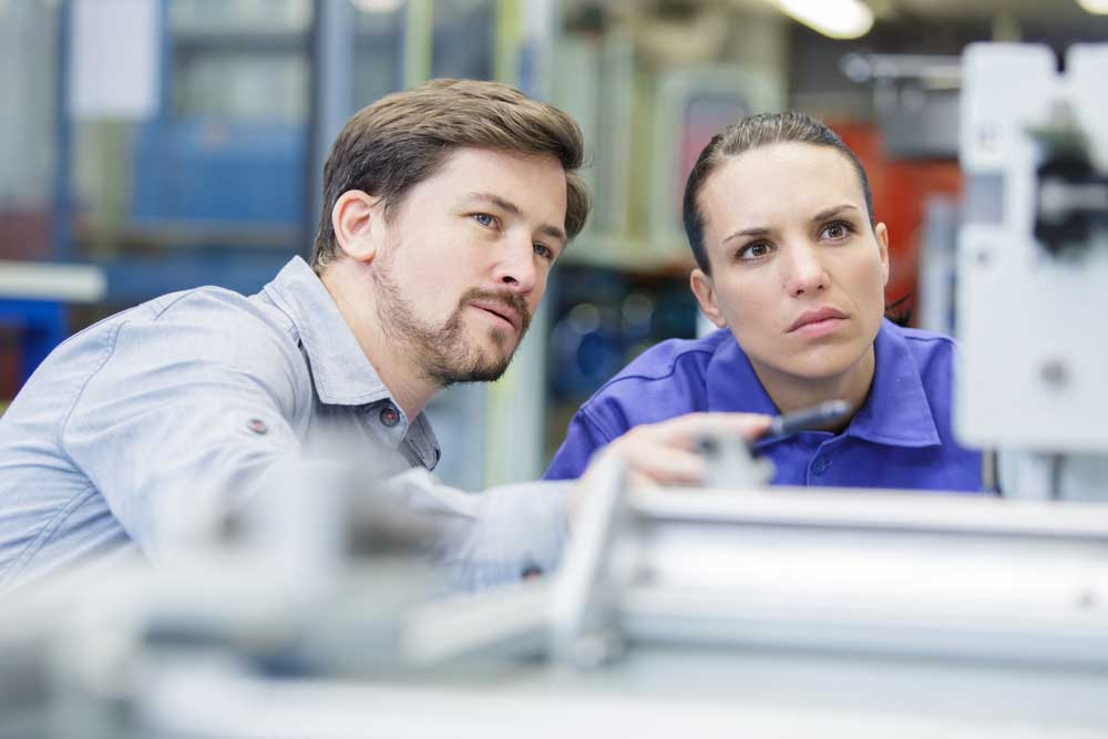 Engineer & Designer running a PCBA testing